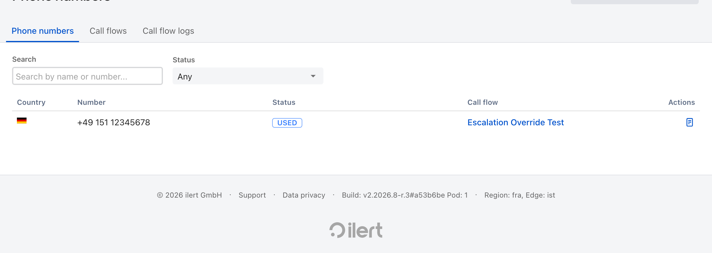 The Phone numbers page in ilert, listing one number with country, number, a USED status chip, and the call flow it is assigned to, above a Request a phone number button.