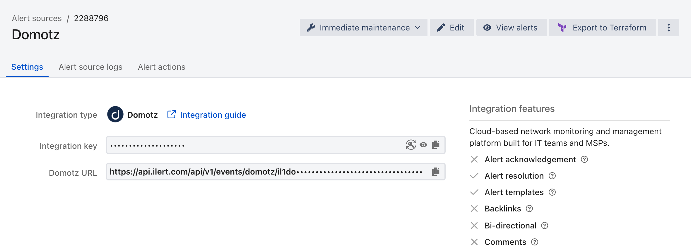The Settings tab of a Domotz alert source in ilert, showing the integration type, the masked integration key, and the Domotz URL.