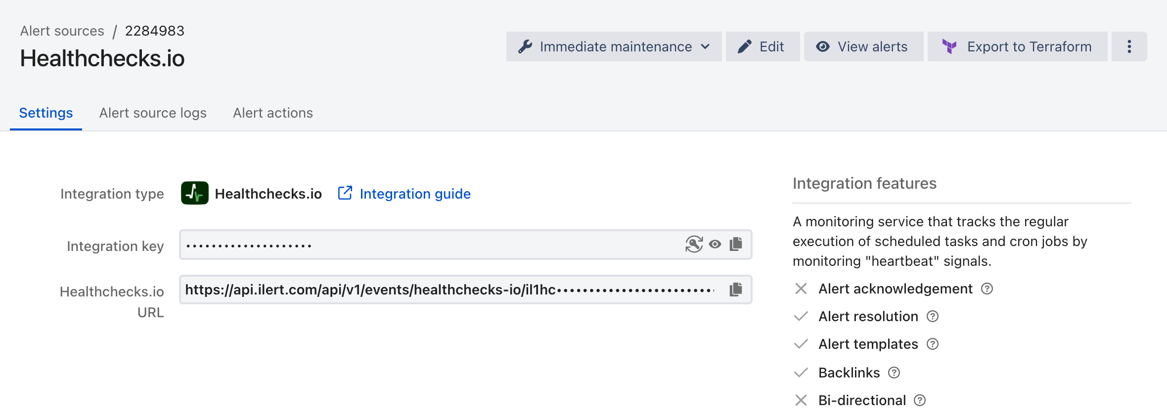 The Settings tab of a Healthchecks.io alert source in ilert, showing the integration type, the masked integration key, and the Healthchecks.io URL.